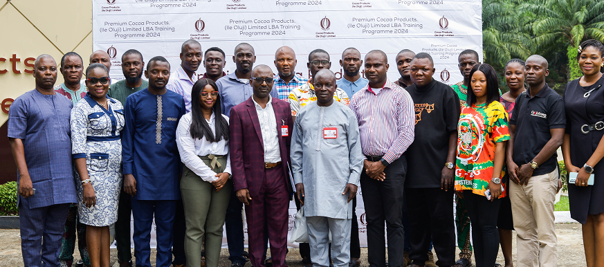 Man in business suit at Oluji Cocoa event